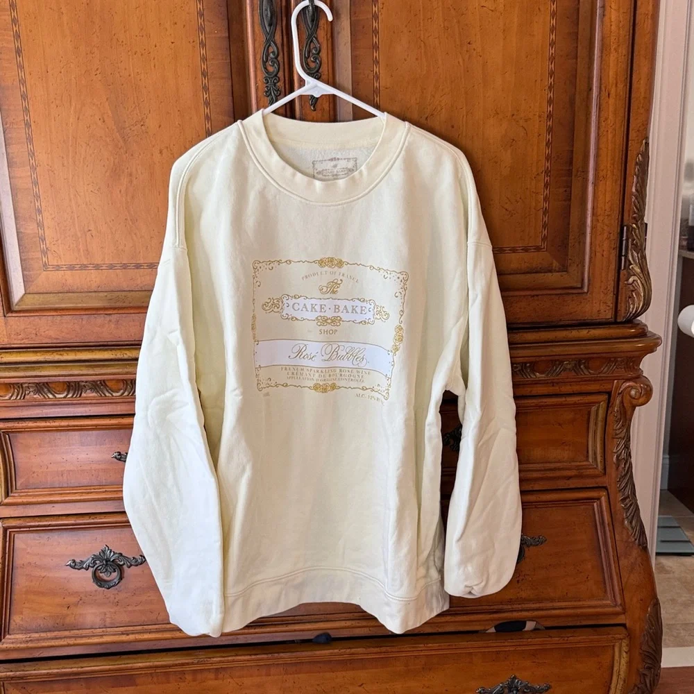 Cake Cream Yellow 'Cake-Bake Shop Rosé Bubbles' Graphic Sweatshirt - Picture 3 of 5